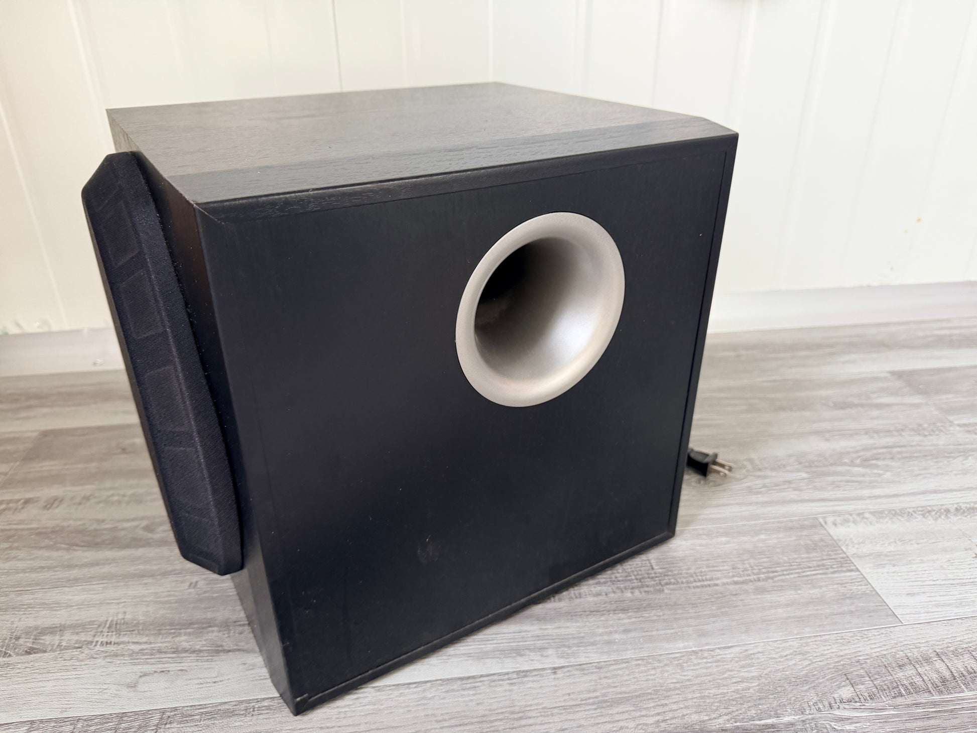 Yamaha YST-SW216 subwoofer side view showing port