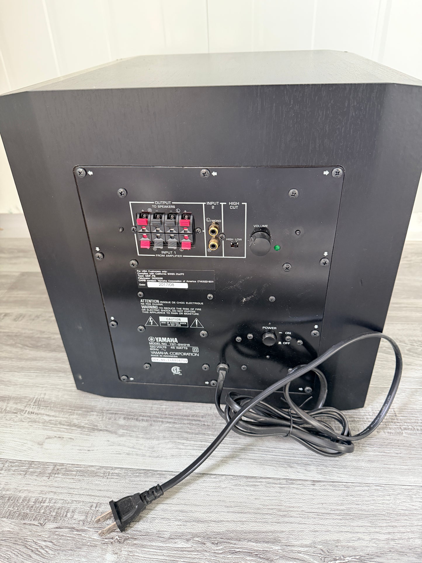 Yamaha YST-SW216 subwoofer rear panel with inputs and controls